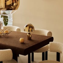Tom Dixon Bell LED Portable Lamp - Gold on Dining Table