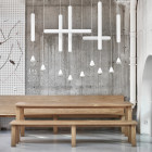 White Brokis Puro LED Pendants over Dining Table