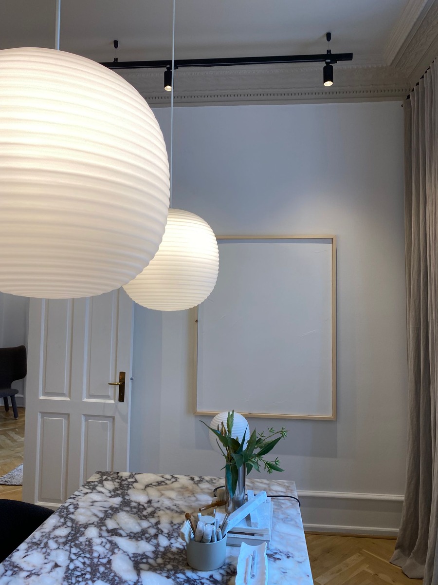 New Works Lantern pendants over kitchen island