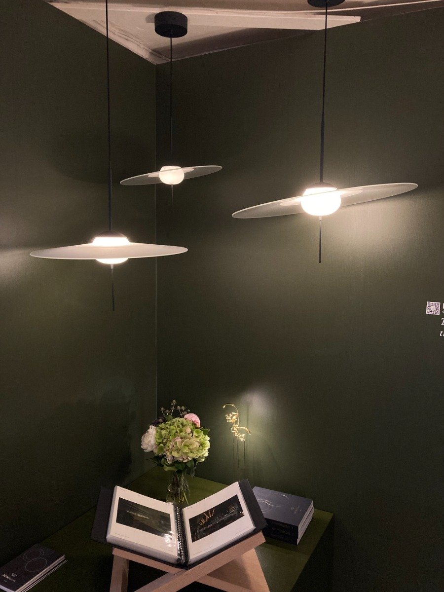 Mono pendant lights in cluster above table