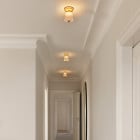 Row of Nuura Asteea Ceiling Lights in Hallway