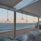 Bover Marietta Outdoor LED Pendant on the Beach