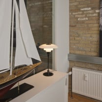 Louis Poulsen PH 3/2 Table Lamp Lifestyle Sideboard 2
