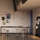 Artemide Funivia Lighting System in a Workspace