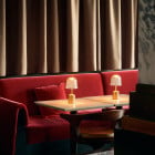 Nuura Asteea LED Portable Lamp in Restaurant