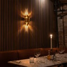 Skyline Wall Light in Brass in a Restaurant