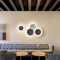 Vibia Puck LED Wall Art in Cafe