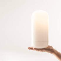 Artemide Gople Portable LED Table Lamp In Hand