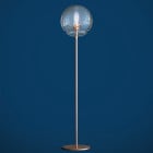 Artemide Vitruvio Floor Lamp Brass on Blue Background
