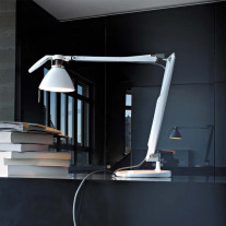  White Luceplan Fortebraccio Table Lamp in a Workspace