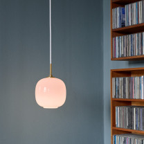 Louis Poulsen VL 45 Radiohus Pale Rose Pendant next to bookcase