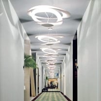 Artemide Pirce Suspension in Hotel Hallway