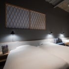 Louis Poulsen NJP LED Wall Lamp in Bedroom