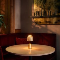 Nuura Asteea LED Portable Lamp on Table