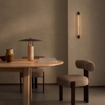 J. Adams & Co Strata 600 LED Wall Light Beside Table