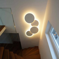 Vibia Puck LED Wall Art on Staircase