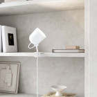 White Design For The People Angle Clamp Lamp on Bookcase