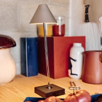Santa & Cole Gira Mini Portable Lamp on Desk