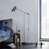 Northern Birdy Floor Lamp Grey Beside Sofa