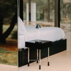 Santa & Cole Gira Mini Portable Lamp at Bedside